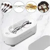 A collage showing a mini ultrasonic cleaner with glasses inside, and smaller circular images of makeup brushes, glasses, jewelry, and watches. Voir les images du produit