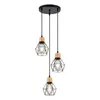 A three-light pendant lamp with geometric wire cages and wooden accents, suspended from a circular black ceiling plate. Voir les images du produit