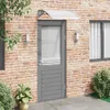 A grey and transparent door canopy mounted on a brick wall above a grey door. Produktbild-Vorschau