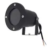 A black outdoor spotlight with a bracket and wires, isolated on a white background. Anteprima dell’immagine prodotto