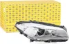 A car headlight and its packaging are shown. Produktbild-Vorschau