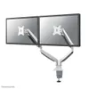 A dual monitor desk mount with a clamp base. Voir les images du produit