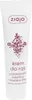 A white tube of hand cream with purple text and a decorative purple design. Produktbild-Vorschau