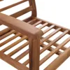 A close-up view of the wooden armrest and slatted seat of an outdoor chair. Náhled obrázku produktu