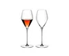 Two wine glasses on a white background. One glass contains red wine. Podgląd zdjęcia produktu