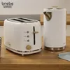 A white toaster and a white electric kettle are placed on a wooden countertop. Produktbild-Vorschau