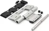 A disassembled hinge and its components are laid out on a white background. Produktbild-Vorschau