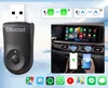 A product image showing a black Ottocast adapter, a car dashboard with a screen displaying app icons, and two smartphones connected wirelessly. Produktbild-Vorschau
