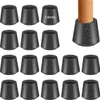 A collage of black silicone furniture leg caps, with one cap on a wooden table leg. Produktbild-Vorschau