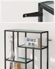 A close-up shot of a modern black metal bookshelf with glass shelves and decorative items like vases and a clock. Náhled obrázku produktu