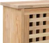 A close-up view of a wooden cabinet with a slatted front. Náhľad obrázku produktu