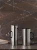 Stelton EM77 Verseuse isolante 1 l. steel Voir les images du produit 6
