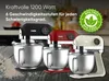 Three kitchen mixers in different colors are displayed on a surface with flour scattered around. Produktbild-Vorschau