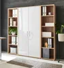 A modern office shelving unit with white high-gloss doors and oak-effect shelving, set against a dark gray textured wall. Produktbild-Vorschau