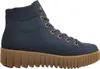 A side view of a navy blue lace-up boot with a thick brown sole. Voir les images du produit