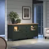 A dark green sideboard with a wooden top is displayed in a well-lit room, showcasing its storage and display capabilities. Podgląd zdjęcia produktu