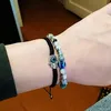 INF Makramee-Armband mit schützender Hamsa-Hand Schwarz Produktbild-Vorschau 4