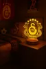 A bedside table with a Galatasaray themed lamp and pillow. Produktbild-Vorschau