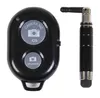 A black Bluetooth selfie remote and a black stylus are shown against a white background. Produktbild-Vorschau