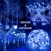 A collage of images showing blue LED string lights decorating trees and an outdoor dining area, with a close-up of the coiled lights. Produktbild-Vorschau
