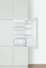 An open built-in refrigerator with empty shelves. Produktbild-Vorschau