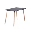 A black rectangular table with light brown wooden legs, shown from a slightly elevated side angle against a white background. Náhled obrázku produktu