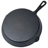 The underside of a black cast iron frying pan is shown against a white background. Produktbild-Vorschau
