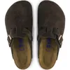 A top-down view of a pair of brown Birkenstock Boston clogs. Produktbild-Vorschau