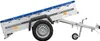 A trailer with a blue tarp cover, shown on a white background. Podgląd zdjęcia produktu