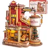 A 3D wooden model of a gift factory with lights on. Podgląd zdjęcia produktu
