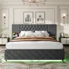 A bedroom with a large upholstered bed as the main focus. Náhled obrázku produktu
