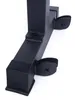Close-up of the base of a black metal structure, likely part of a weight bench or similar equipment, showing its feet and some attachment points. Produktbild-Vorschau