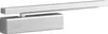A silver door closer mechanism with an attached arm, shown in a studio setting against a white background. Produktbild-Vorschau