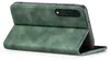 A green flip case for a smartphone is shown from a side angle, with the front cover folded back. Produktbild-Vorschau