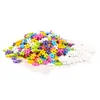 A pile of colorful building blocks on a white background. Produktbild-Vorschau