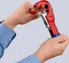Hands using a pipe cutter on a copper pipe. Produktbild-Vorschau