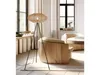 A modern living room with a floor lamp, chairs, and a coffee table. Produktbild-Vorschau