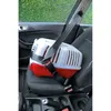 A pet carrier is secured with a seatbelt on a car seat. Anteprima dell’immagine prodotto