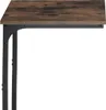 A close-up view of the corner of a small table, showing the wooden top and black metal legs. Náhled obrázku produktu