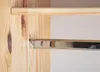 A close-up view of a wooden shelf with a metal bar attached. Produktbild-Vorschau