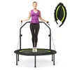 A woman is jumping on a trampoline with a handle and resistance bands. Náhľad obrázku produktu