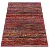 A close-up, angled view of a rectangular rug with a striped pattern. Produktbild-Vorschau