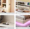 Collage of four images showcasing different features of a bed, including storage, USB port, and LED lighting. Produktbild-Vorschau