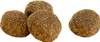 Four brown, round dog food kibbles are shown against a white background. Three kibbles are clustered together on the left, and one is separate on the right. Produktbild-Vorschau