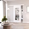 A modern living room with a sliding door with a mirror, a coffee table, a floor lamp, and a plant. Produktbild-Vorschau