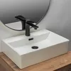 A white rectangular vessel sink with a black faucet is shown on a wooden countertop. Náhľad obrázku produktu
