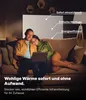 A couple relaxing on a couch with a laptop, with marketing text overlayed. Anteprima dell’immagine prodotto