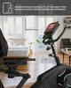 A recumbent exercise bike in a home setting, with text overlay describing a feature. Produktbild-Vorschau