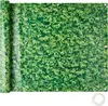 A rolled-up green privacy screen with a leaf pattern, shown on a white background. Produktbild-Vorschau