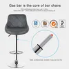 A bar stool with a close-up view of its gas lift mechanism, surrounded by marketing text and certification logos. Produktbild-Vorschau
